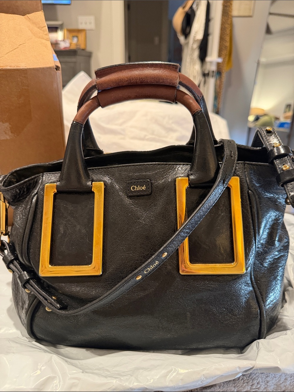 Chloé Black Leather Crossbody Bag with Gold Hardware and Brown Handle Accent